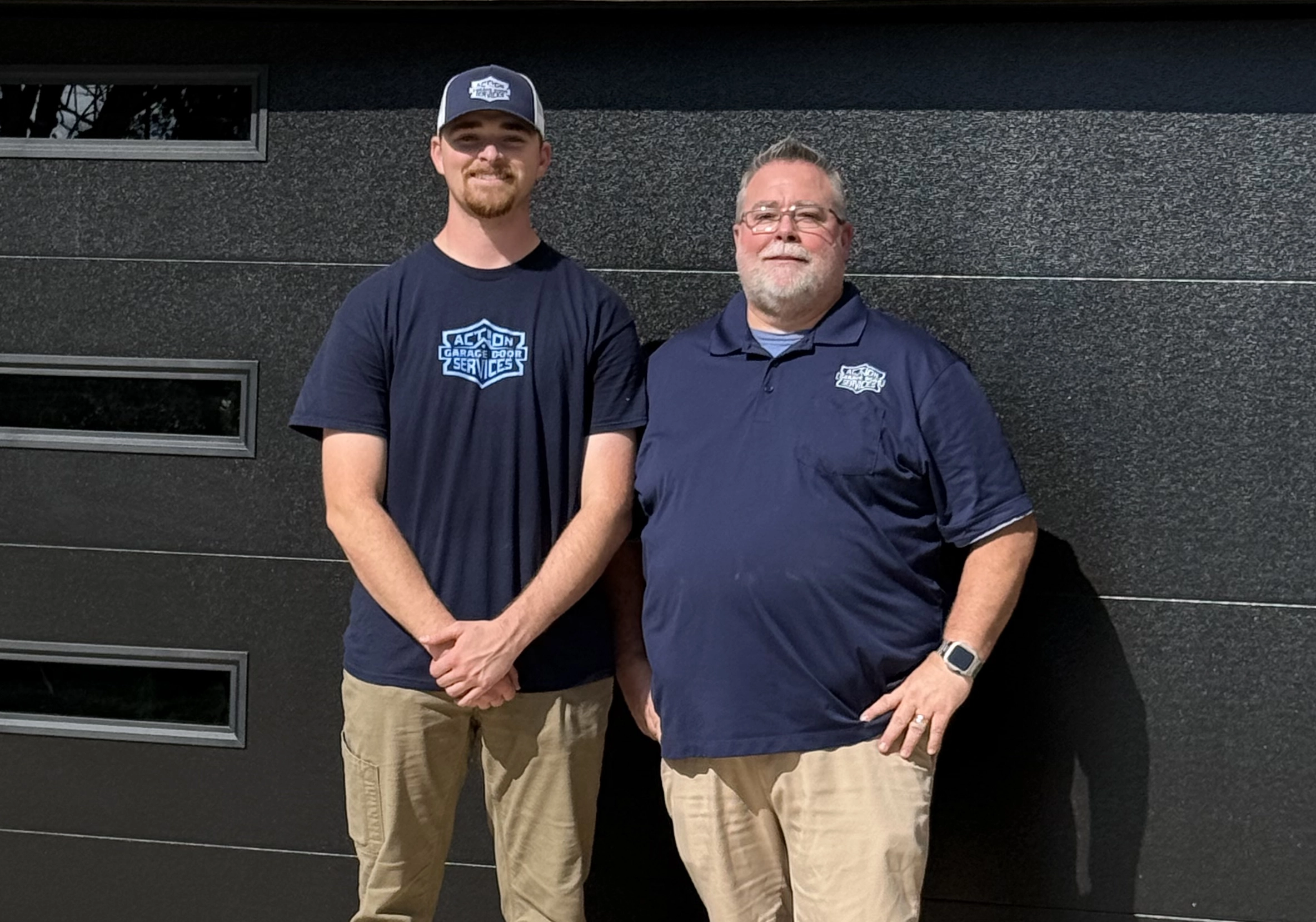 Jeff and his son outside a customer&rsquo;s garage